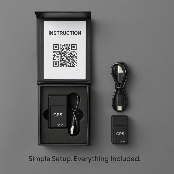 GPS device with packaging, cable, and instruction sheet on a gray background