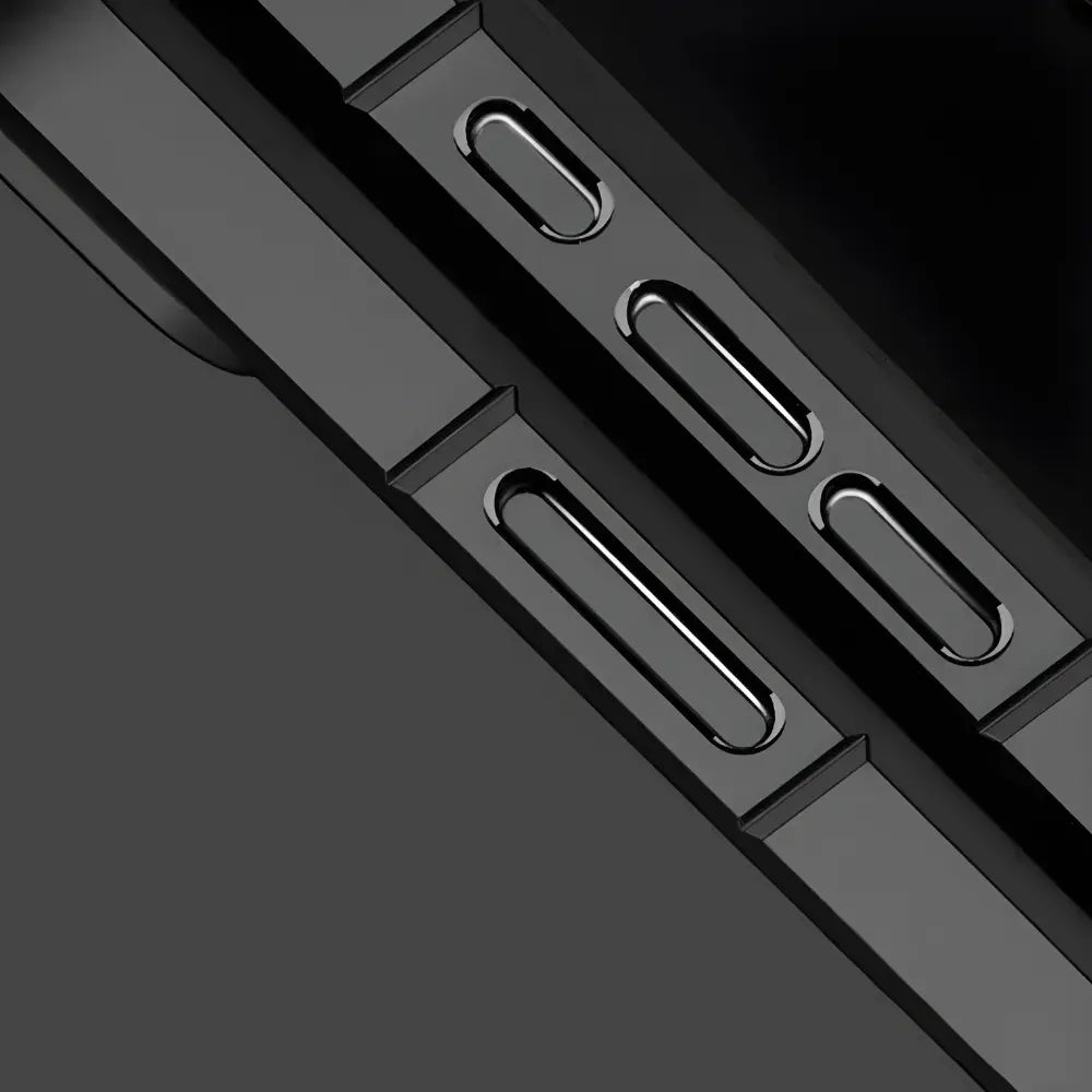 Close-up of a black phone case with cutouts for buttons on a dark background