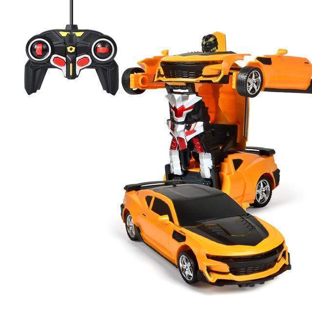 Toy robot transforming from a car with a remote control on a white background