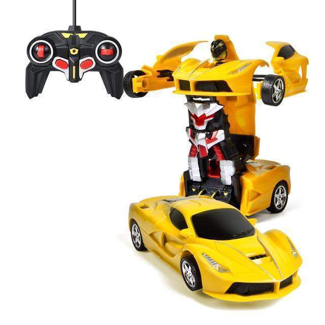 Yellow toy car with robot figure and remote control on a white background