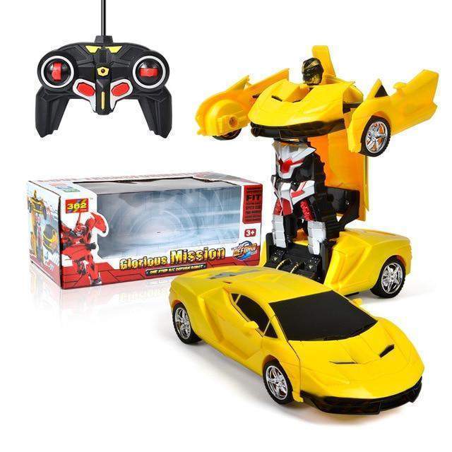 Toy robot in yellow car form with remote control and packaging on a white background
