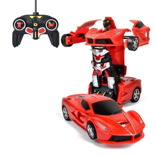 Red toy car transforming into a robot with a remote control on a white background