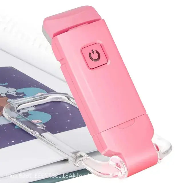 Pink handheld device with a power symbol on a white background