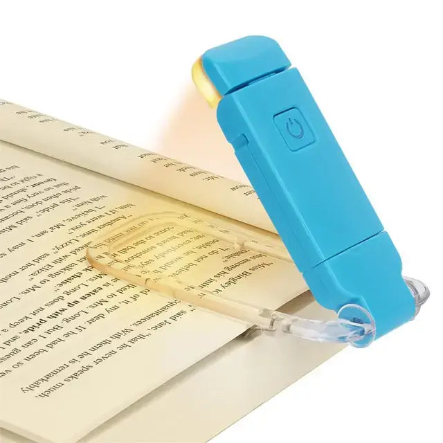 Blue booklight illuminating a page of text on a white background